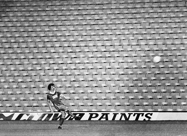 Terry McDermott plays his last game for Liverpool in front of an empty stand