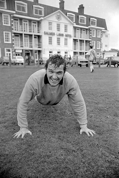 Terry Paine of Hereford United in the pouring rain at the Balmer Lawn Hotel in the New
