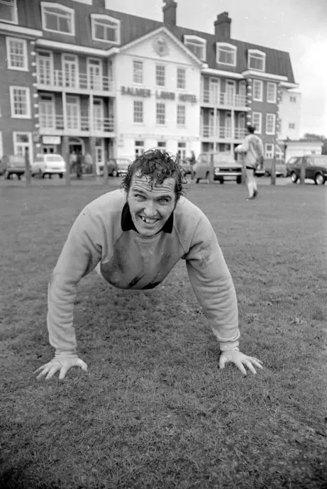Framed Print : Terry Paine of Hereford United in the pouring rain at the Balmer Lawn Hotel in the New