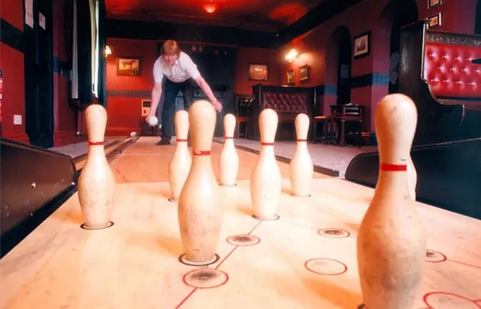 Framed Print : Terry Richardson of the Stags Head in Butterknowle playing pub ten pin bowling in May