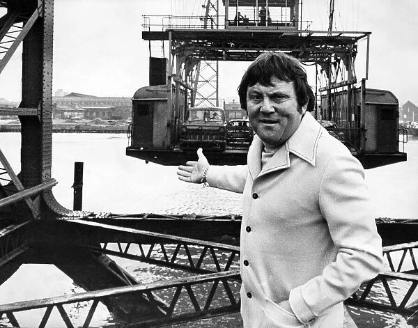 Terry Scott, actor poses for pictures next to the Tees Transporter Bridge, Middlesbrough