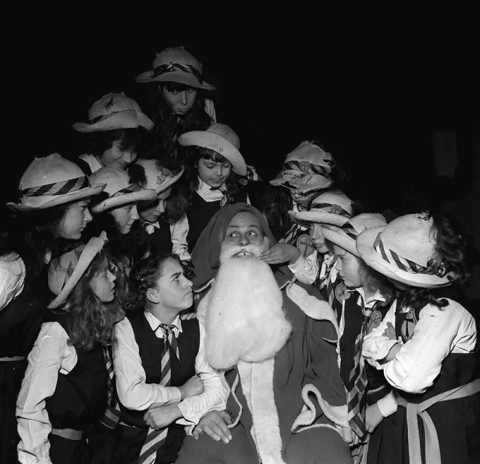 Framed Print : Terry Thomas 1957 as Father Christmas with girls from St Trinians Gap toothed Framed Print : Terry Thomas 1957 as Father Christmas with girls from St Trinians Gap toothed