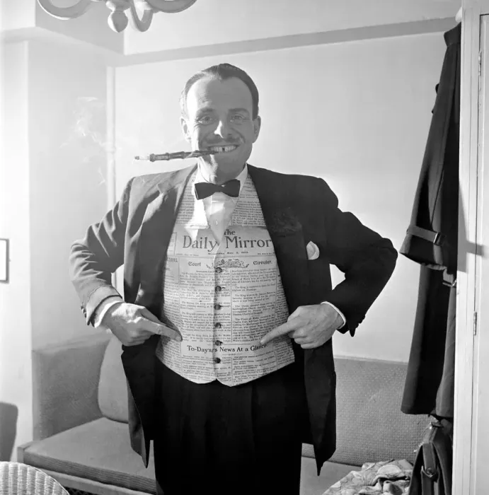 Framed Print : Terry Thomas tries out the waistcoat designed using the Daily Mirror at the Palladium Framed Print : Terry Thomas tries out the waistcoat designed using the Daily Mirror at the Palladium