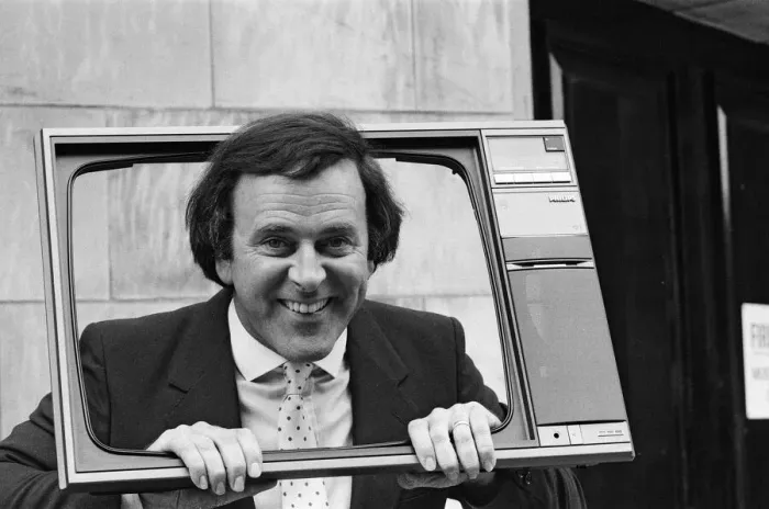 Framed Print : Terry Wogan was given 100 new TV sets today. They are being presented by Phillips the TV Framed Print : Terry Wogan was given 100 new TV sets today. They are being presented by Phillips the TV