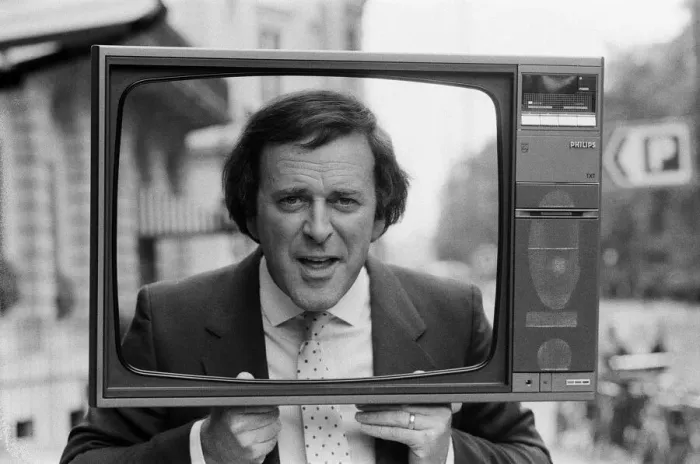 Framed Print : Terry Wogan was given 100 new TV sets today. They are being presented by Phillips the TV Framed Print : Terry Wogan was given 100 new TV sets today. They are being presented by Phillips the TV