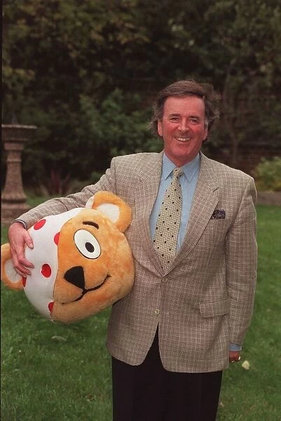 TERRY WOGAN WITH THE HEAD OF PUDSEY BEAR - PROMOTING THE BBC CHARITY EVENT CHILDREN IN