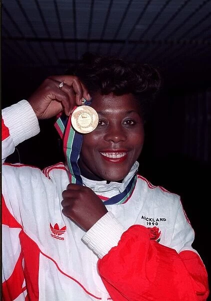 Tessa Sanderson athlete with Olympic Gold medal 2  /  90 at Heathrow airport after