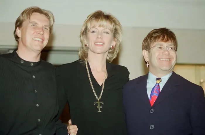Framed Print : Theo and Louise Fennell with Elton John at the opening of Theo Fennell s