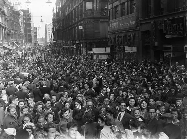 Thousands of Revellers packed into New Street, Birmingham to celebrate VJ Day with gusto