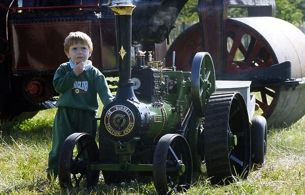 Three-year-old Richard Baillie from Forest hall with a miniature traction engine on 13th