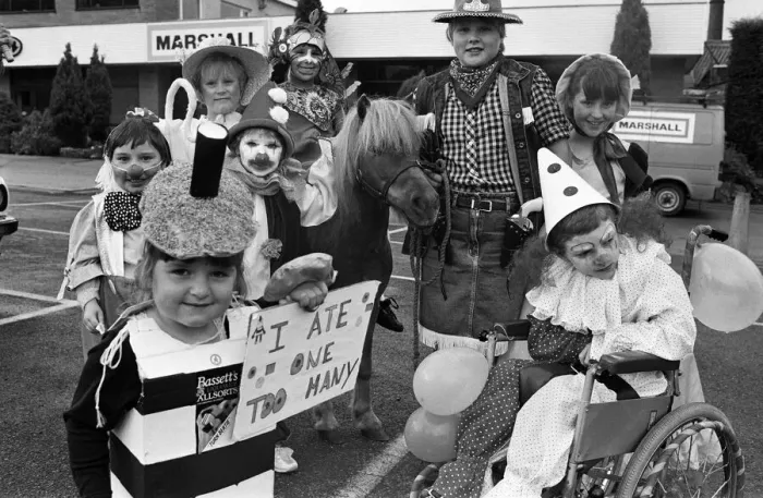 Framed Print : Three-year-old Zoe Taylor is pictured with prize-winners from the fancy dress competition