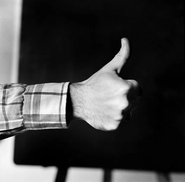 Thumbs up. Mans hand. January 1975 75-00146-001