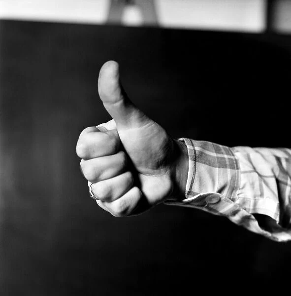 Thumbs up. Mans hand. January 1975 75-00146
