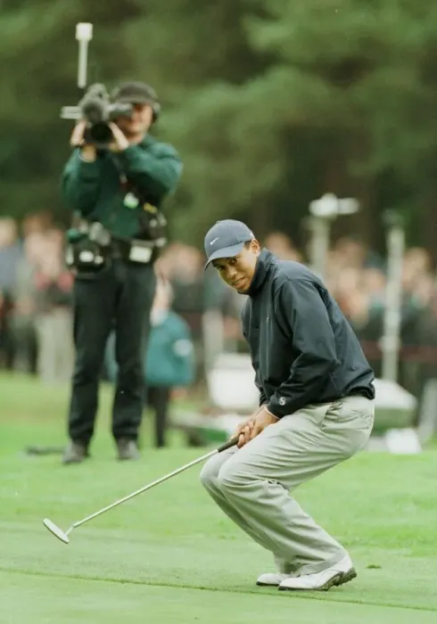 Framed Print : Tiger Woods watches a putt just miss the hole October 1998 during the 1998 World