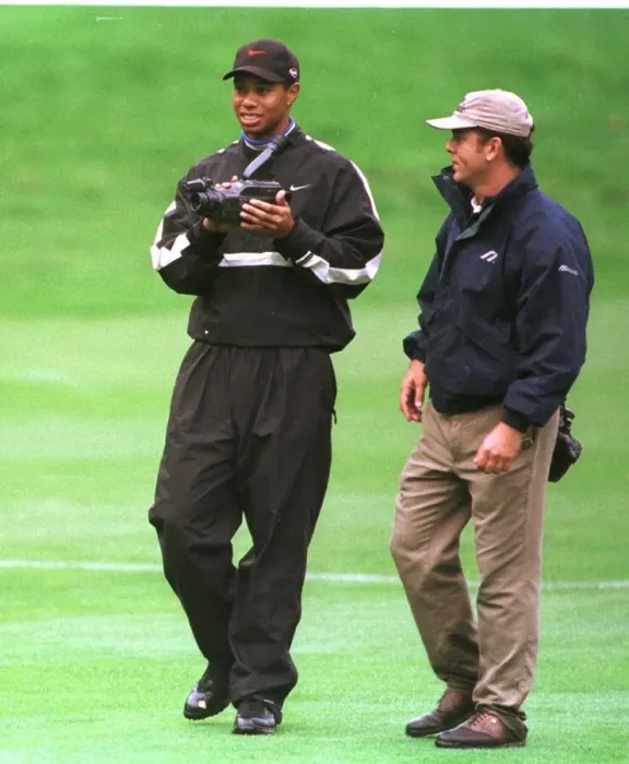 Framed Print : Tiger Woods watches his swing on video October 1998 during his practice round in