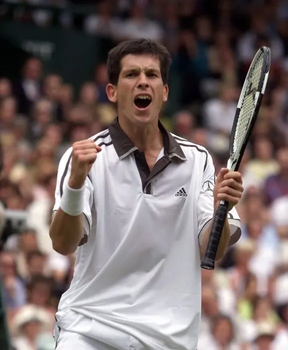 Framed Print : Tim Henman celebrates victory over Jim Courier in the fourth round mens single