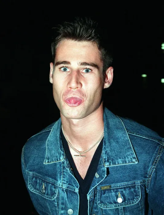 Framed Print : TIM VINCENT TV PRESENTER September 1998 Sticking tongue out at camera denim jacket