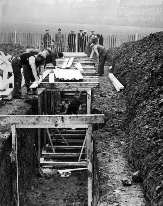 Framed Print : Timbering up the deep trenches in Birkenhead Park. The shelters will have seats along