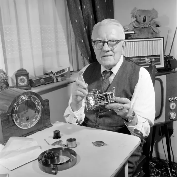 Framed Print : Timelord: Clock repairer Bill Marshall seen here repairing the movement to a mantle clock Framed Print : Timelord: Clock repairer Bill Marshall seen here repairing the movement to a mantle clock