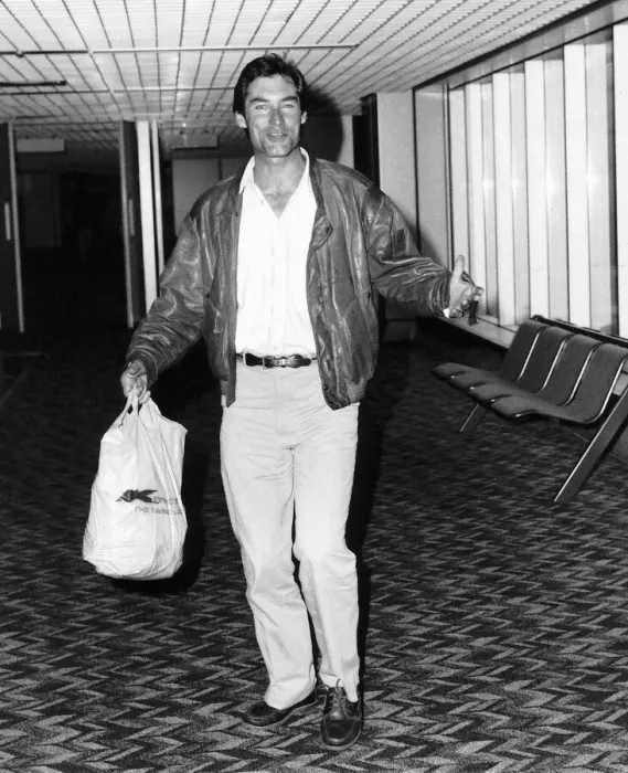 Framed Print : Timothy Dalton actor who stars in the film The Living Daylights arrives at Heathrow Framed Print : Timothy Dalton actor who stars in the film The Living Daylights arrives at Heathrow