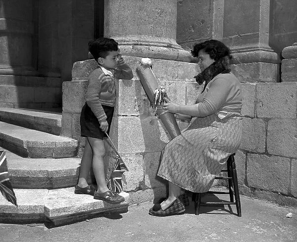 Tinkers in Malta 1954 Mrs Eucaristica Borg photographed as she works in