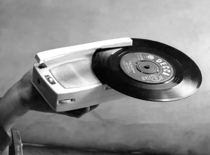Framed Print : A tiny record player which is also a transistor radio in March 1963 27  /  03  /  63