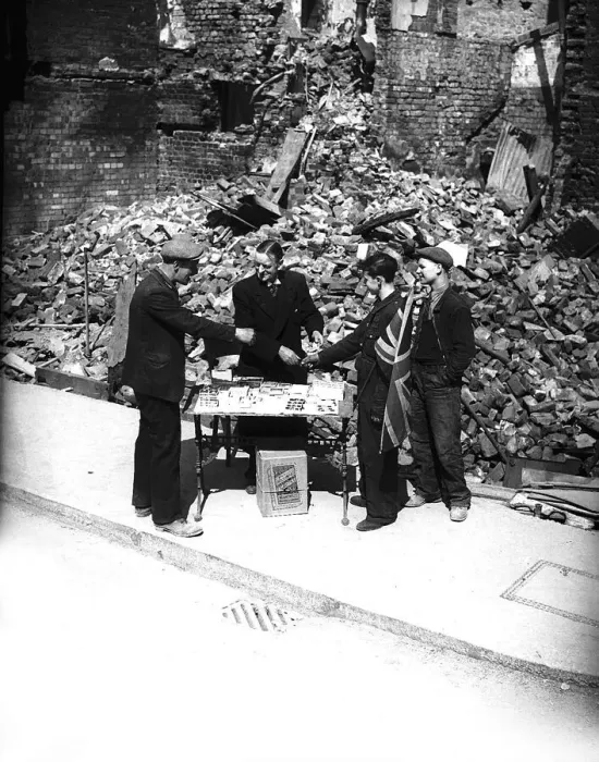Framed Print : Tobacconist sells cigarettes outside bombed shop during London blitz Framed Print : Tobacconist sells cigarettes outside bombed shop during London blitz