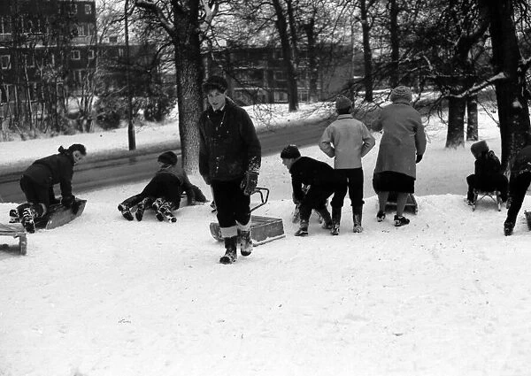Toboggaaining over the snow at The Grove, Kenilworth Road, Coventry