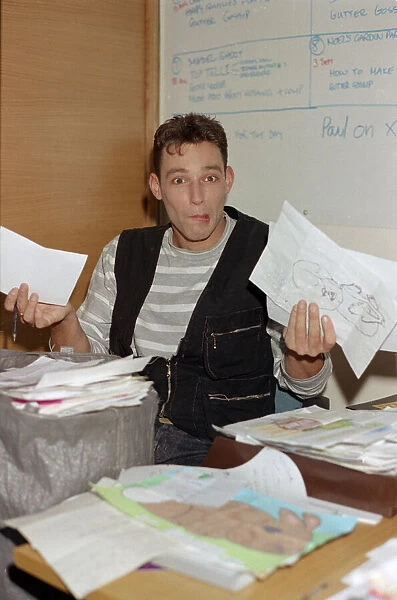 Toby Anstis opening mail at The BBC in the Childrens BBC studio. 8th October 1993