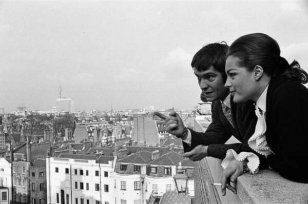 Tom Courtenay and Romy Schneider at the Dorchester Hotel looking at some of the places