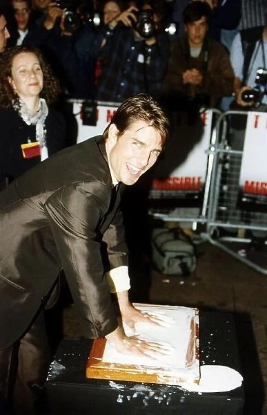 Tom Cruise Film Actor with his hands in some cream
