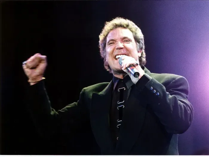 Framed Print : Tom Jones British Singer Singing at Simple Truth concert Holding microphone