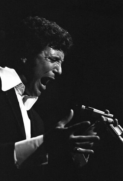 Tom Jones gets the audience dancing on the tables at the Copacabana nightclub, New York