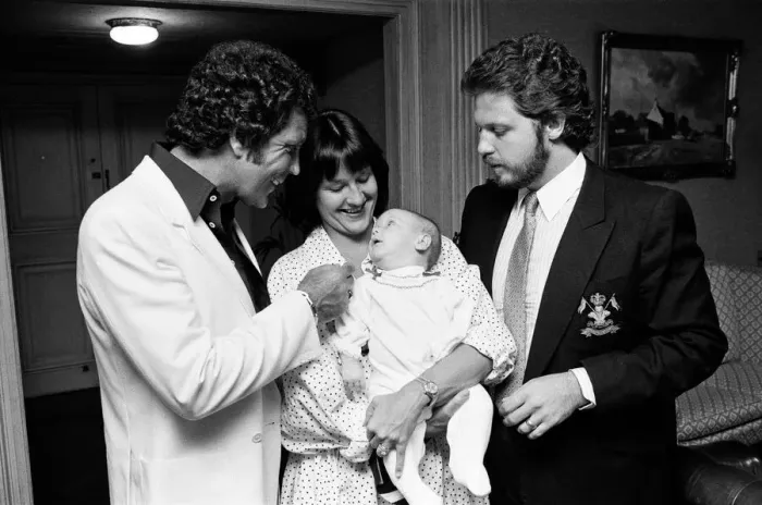 Framed Print : Tom Jones with his grandson Alexander, aged eleven months Framed Print : Tom Jones with his grandson Alexander, aged eleven months
