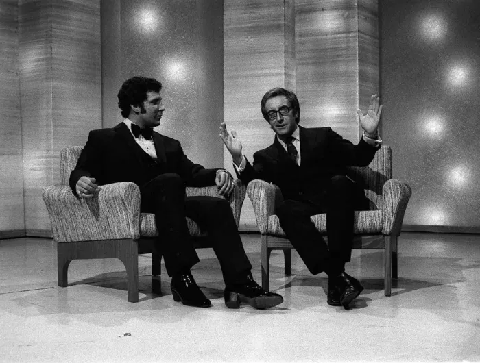 Framed Print : Tom Jones singer January 1969 with actor Peter Sellers sitting having a conversation