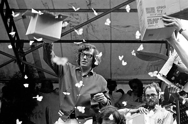 Tom Keylock releasing butterflies at The Rolling Stones on stage at their free concert in
