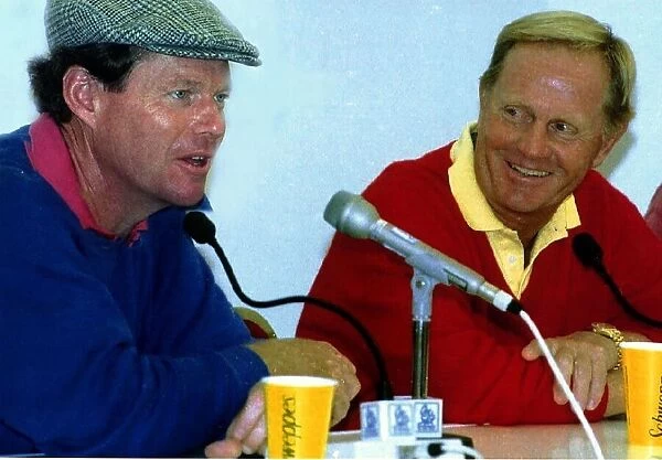 Tom Watson golfer with Jack Nicklaus at the open microphone interview jumper cap