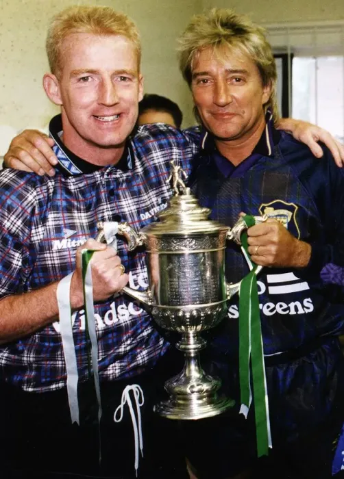 Framed Print : Tommy Burns Celtic football manager and singer Rod Stewart holding cup trophy at Davie
