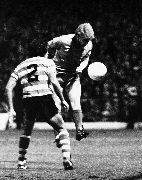 Tommy Burns footballer Celtic FC in UEFA Cup match heading the ball football strip