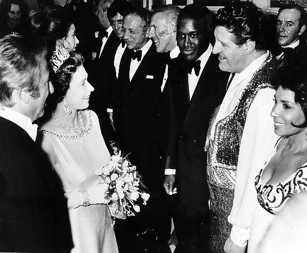 Tommy Cooper Comedian  /  Magician meets Her Majesty Queen Elizabeth II at the London