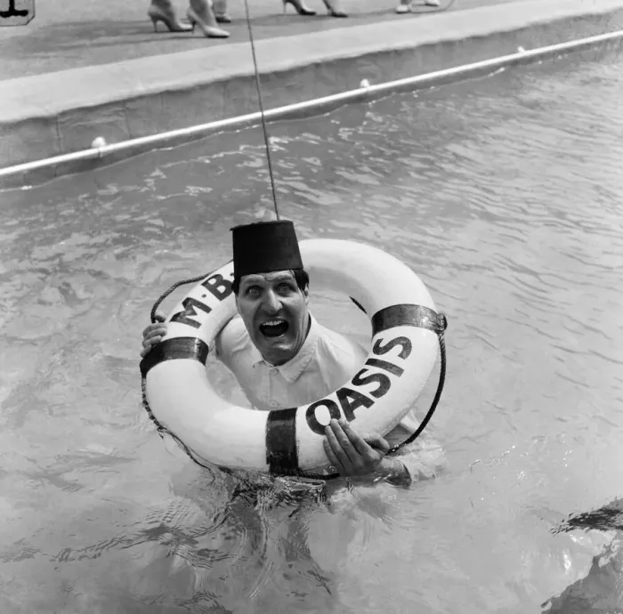 Framed Print : Tommy Cooper opening the Oasis outdoor swimming pool in Holborn for the season Framed Print : Tommy Cooper opening the Oasis outdoor swimming pool in Holborn for the season