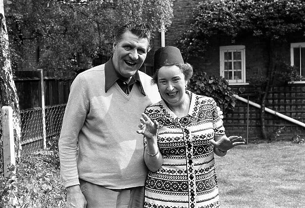 Tommy Cooper and wife Gwen, pictured together in garden of their home, May 1976