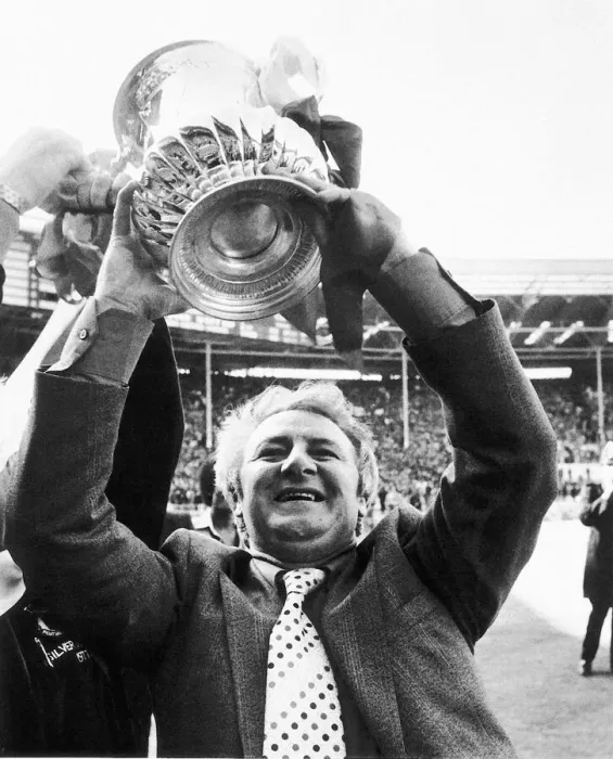 Framed Print : Tommy Docherty manager of Manchester United May 1977 holds up the FA Cup after Framed Print : Tommy Docherty manager of Manchester United May 1977 holds up the FA Cup after