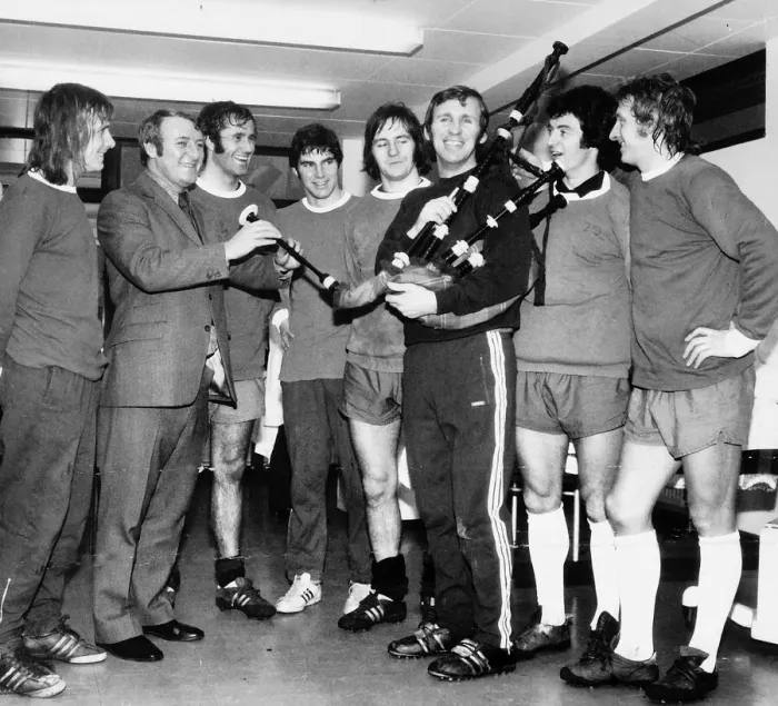 Framed Print : Tommy Docherty with Manchester Scots football Old Trafford 1972 Crerand with bagpipes Framed Print : Tommy Docherty with Manchester Scots football Old Trafford 1972 Crerand with bagpipes