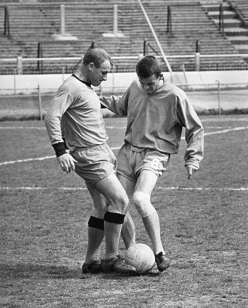 Tommy Docherty tackling Eddie McCreadie during his fitness test. April 1967 P011293