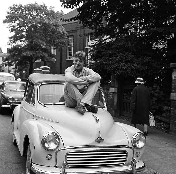 Tommy Steele pictured with his Morris Minor. Yesterday he was fined £