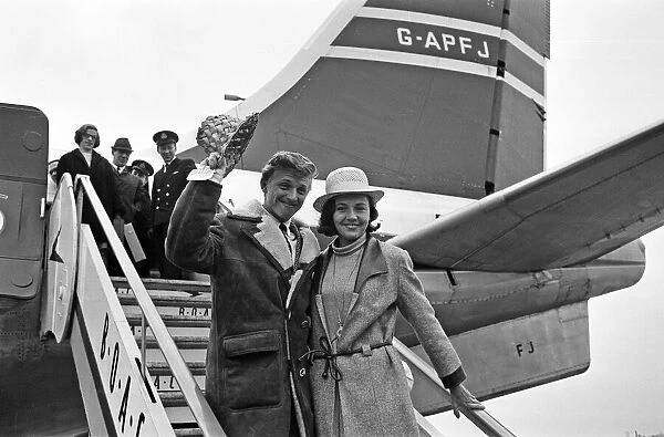 Tommy Steele and his wife Anne arriving at at LAP. 6th January 1964