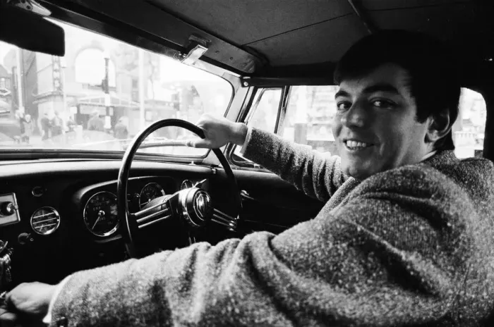 Framed Print : Tony Blackburn, the 22 year old Disc Jockey, on his way to work at The BBC in his red