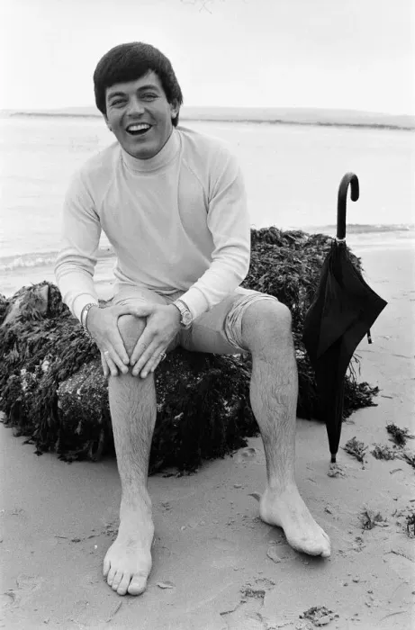 Framed Print : Tony Blackburn on holiday in Poole, Dorset. Summer weather there has not been very good Framed Print : Tony Blackburn on holiday in Poole, Dorset. Summer weather there has not been very good