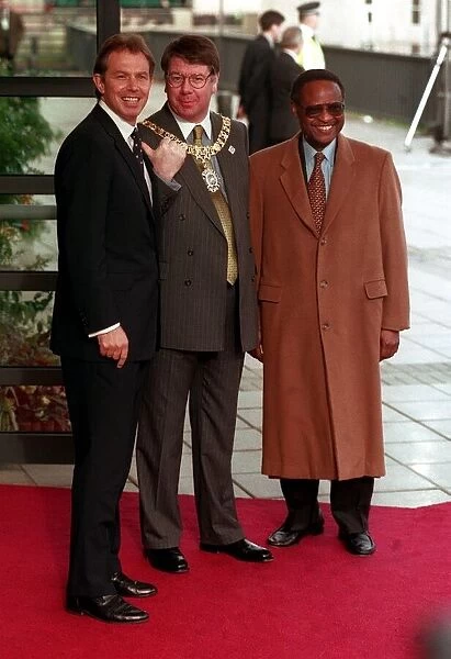 Tony Blair Eric Milligan Emeka Anyaoku October 1997